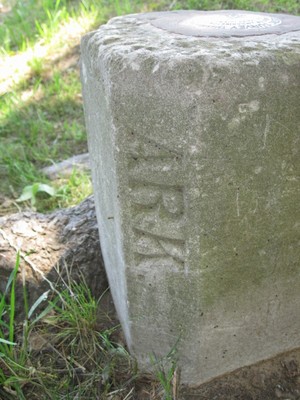 The Arkansas side of the U.S. Geodetic Survey Marker DM1223 identifying the meeting of Arkansas, Louisiana and Texas