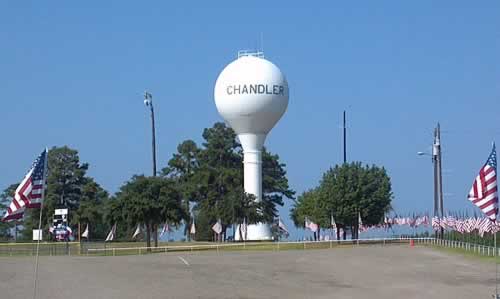 Chandler Water Tower and American Flags in East Texas Chandler Water Tower and American Flags in East Texas
